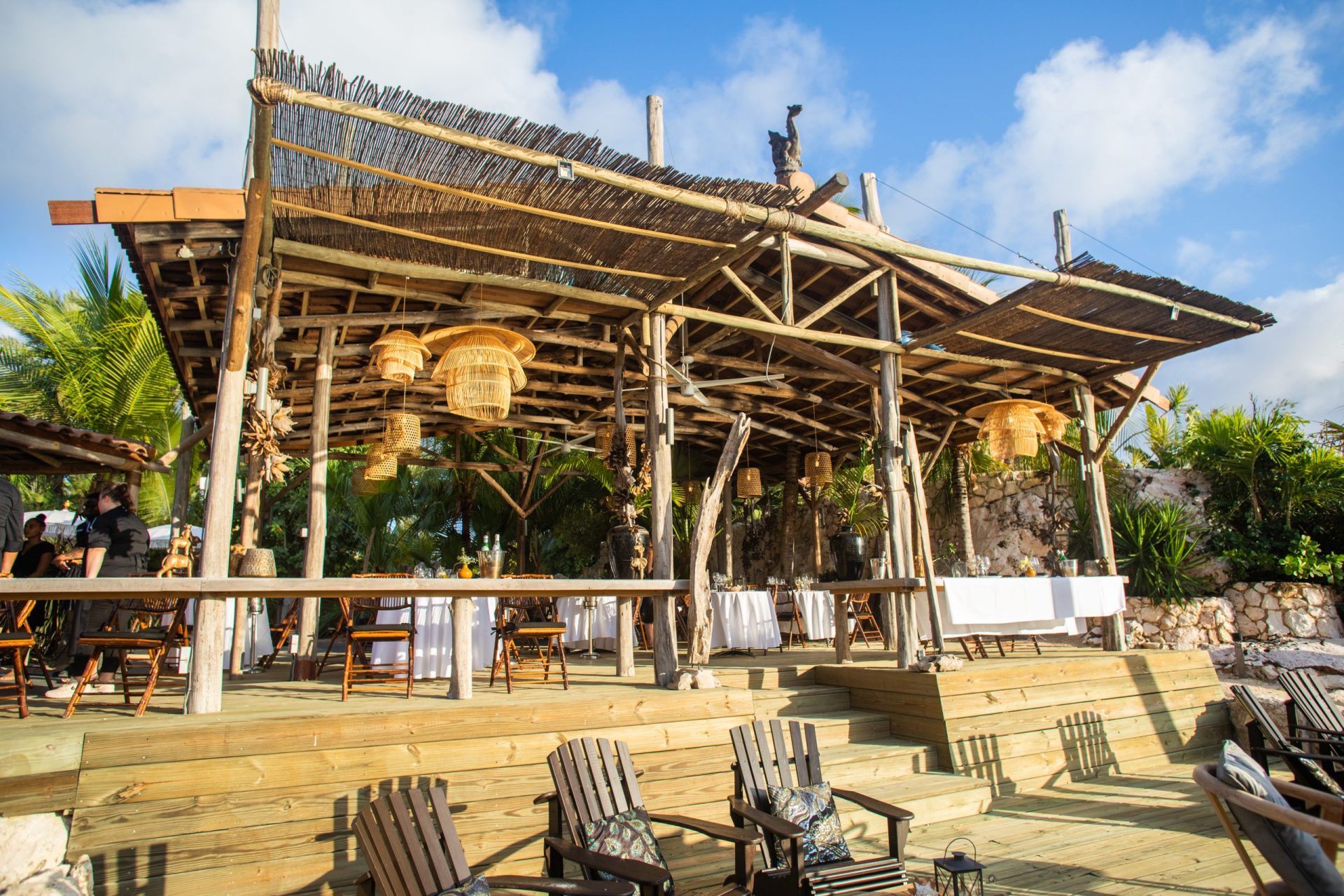 Covered terrace with restaurant tables