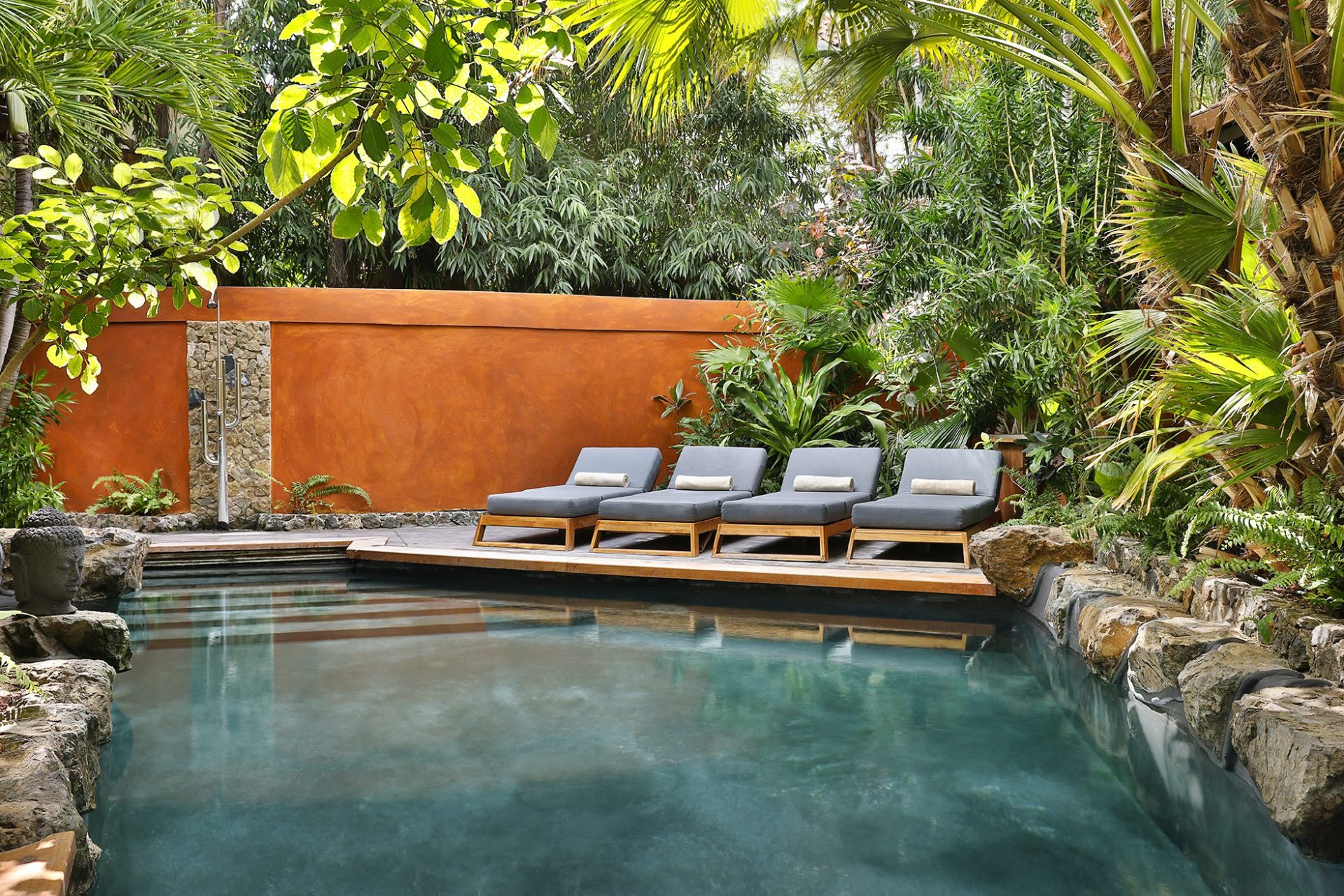 relaxing by a still calming pool