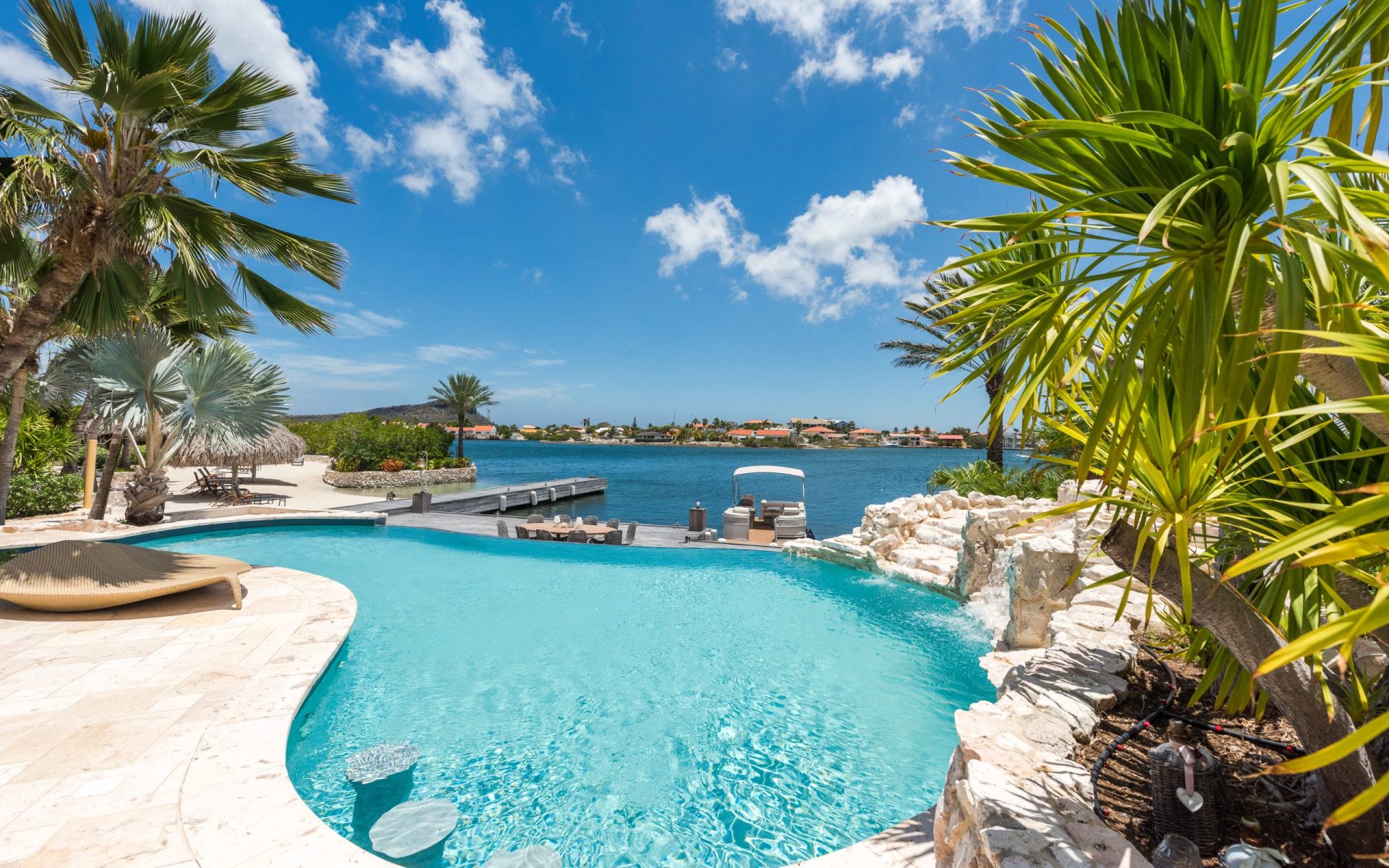 View from the pool at Isla Kiniw with in the background the Spanish Water