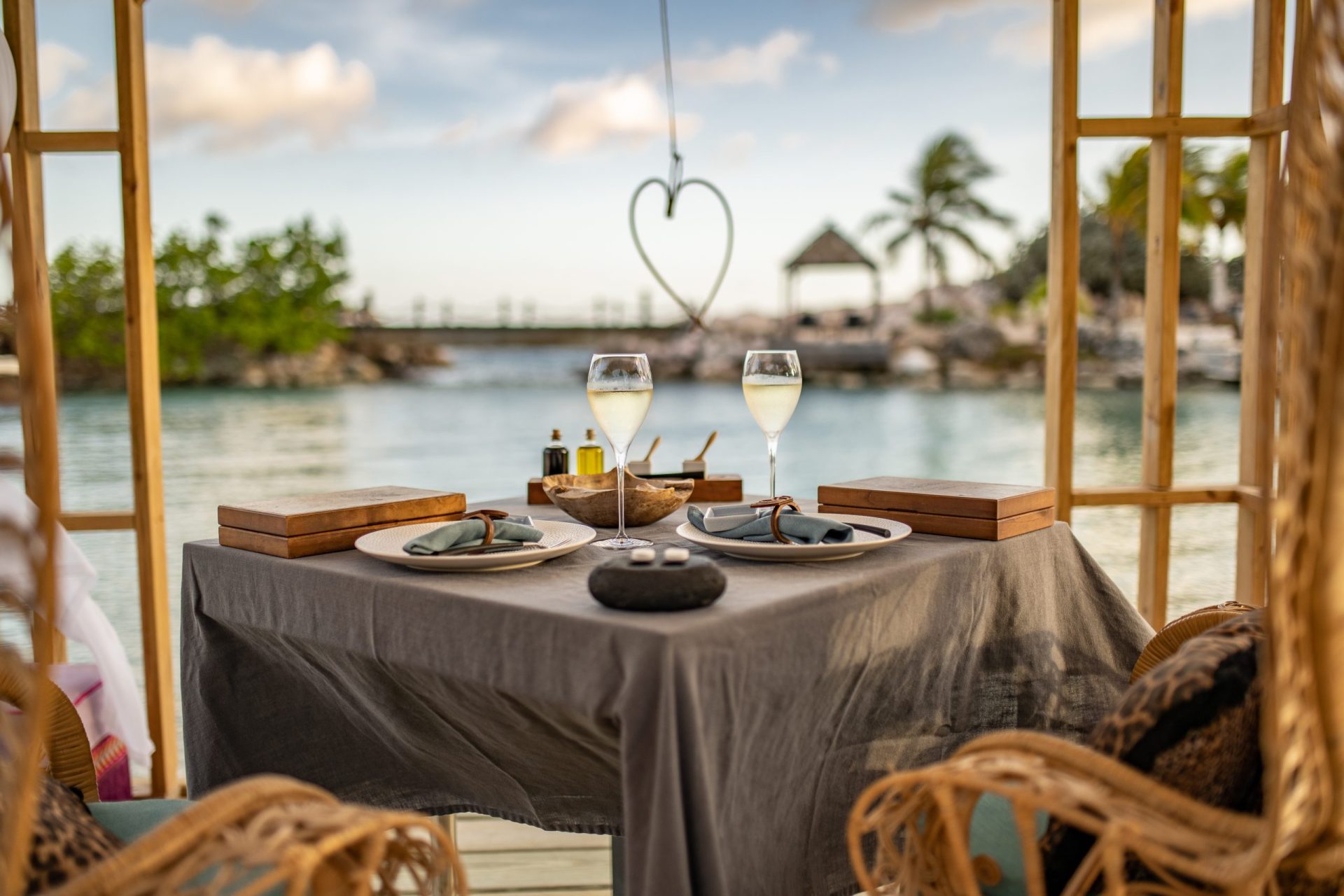 Close-up of a table set-up for dining within a gazebo